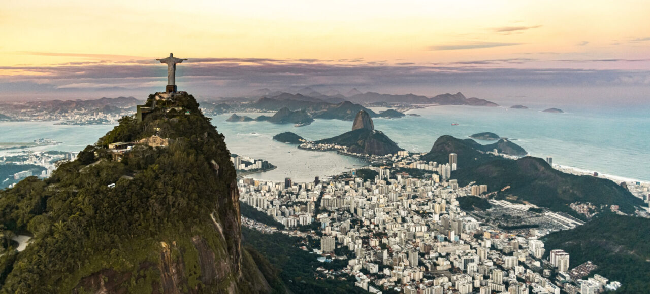 Christ the Redeemer statue in Rio de Janeiro (aerial shot) during a spectacular sunset